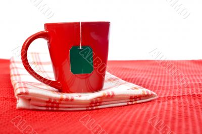 Red cup with tea-bag