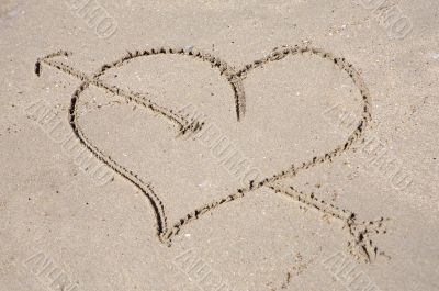 Heart drawn on sand