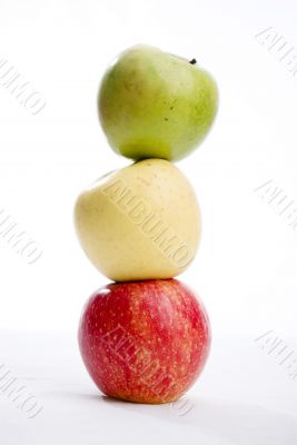 three apples of different colours