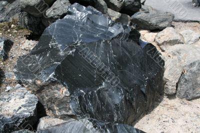 Obsidian boulders from lava flow