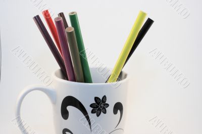 Cup of colored pencils