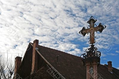christian cross on the cloudy background