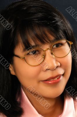 Young Asian woman with glasses