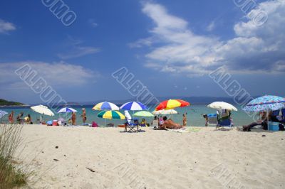 beach with colorful umbrellas