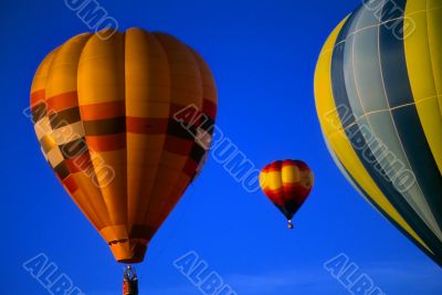 Hot air balloons agaisnt blue sky