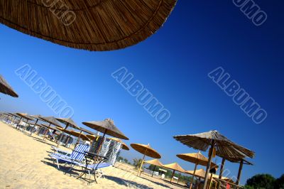 beach with umbrellas