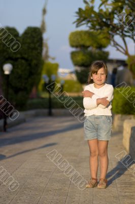 Little girl in sunset lights