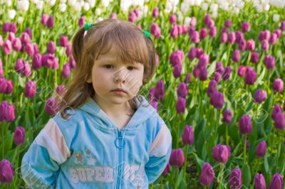 Girl near tulips