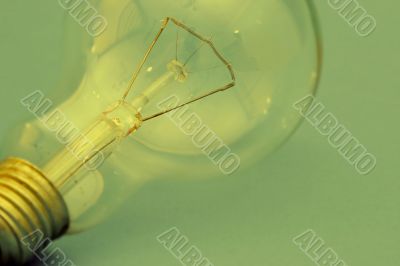 Background with lit lightbulb