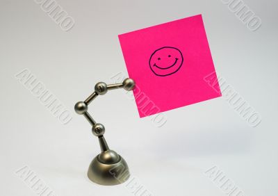 photo holder with a piece of paper with smiling face
