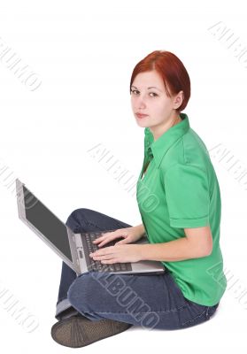 Redheaded girl with a laptop