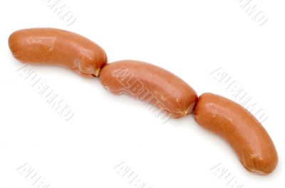 raw frankfurter on white