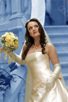Beautiful bride with bouquet walking