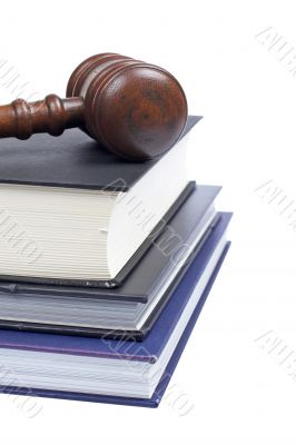 Wooden gavel and law books