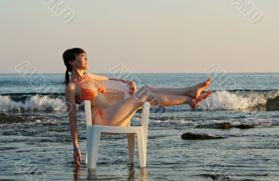 sitting in chair