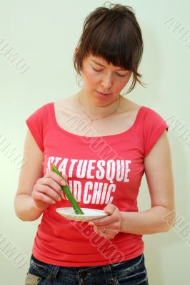 girl eating leek