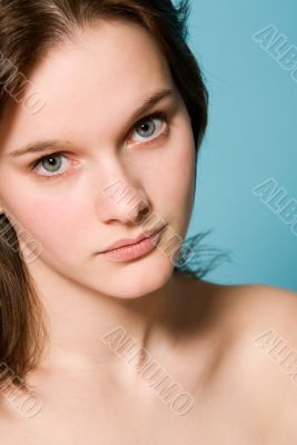 Portrait of a girl on a blue background