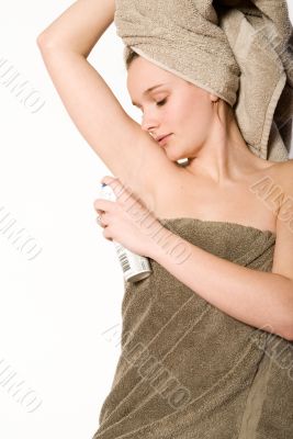 Young wellness girl with deodorant