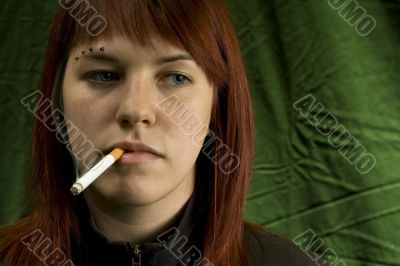 Girl smoking cigarette and bored