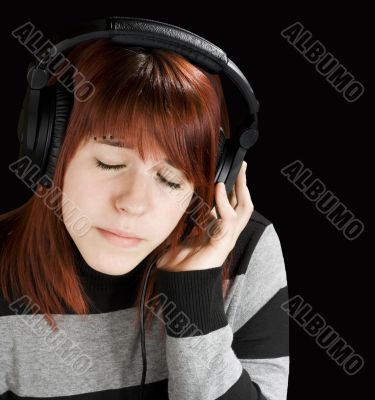 Pensive girl listening to music