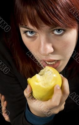 Seductive girl eating apple