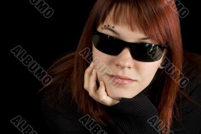Successful girl wearing sunglasses