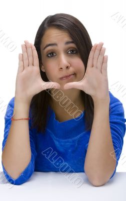 Girl with hands on face