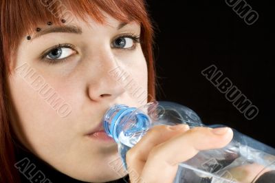 Redhead drinking water