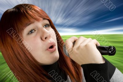 Girl singing on microphone