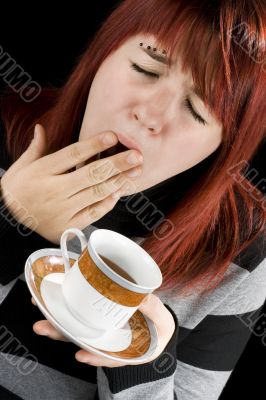 Girl tired preparing to drink coffee