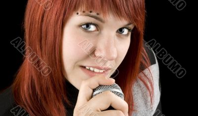 Girl singing on microphone