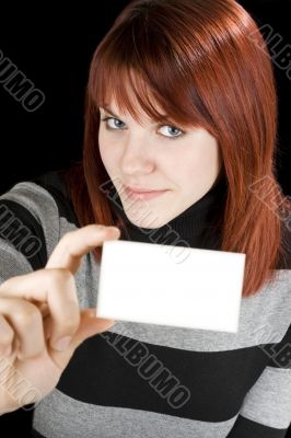 Smiling girl holding a blank card