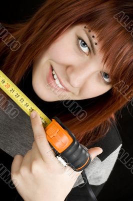 Girl using measuring tape