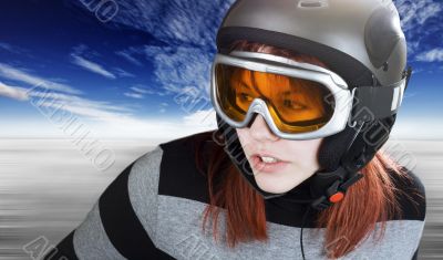 Redhead girl snowboarding