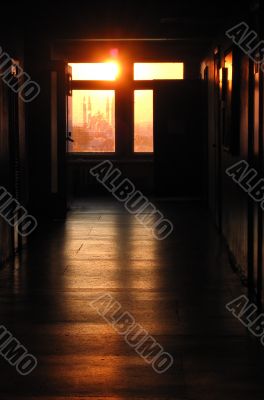 The corridor shined with the low sun.