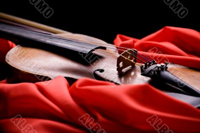 violin on scarlet silk