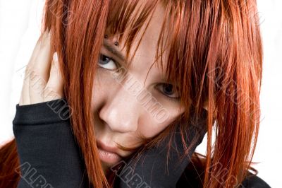 Sad girl holding her head