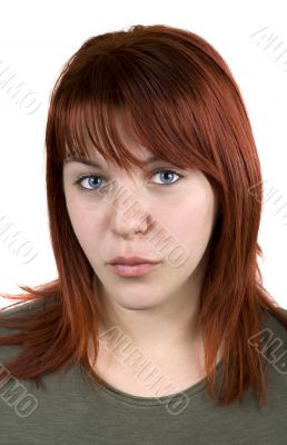 Girl kissing looking at camera