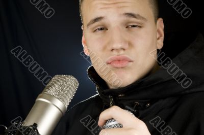 Music boy making a face