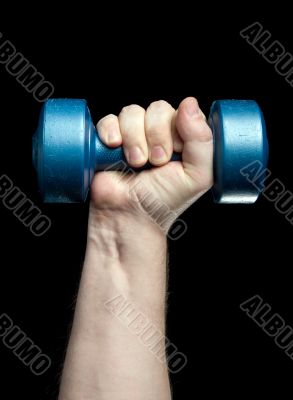 Dumbbell in a hand