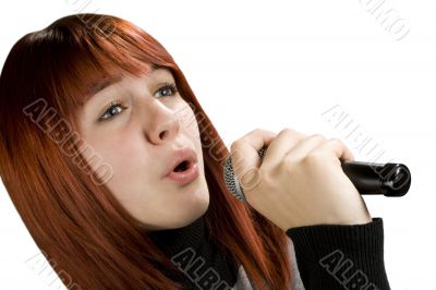 Girl singing on microphone