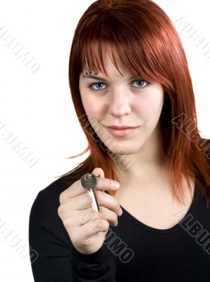 Cute redhead giving real estate key