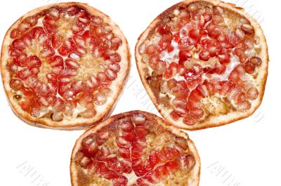 cutting pomegranate on white