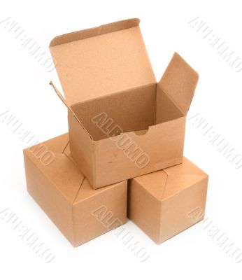 three cardboard boxes on white