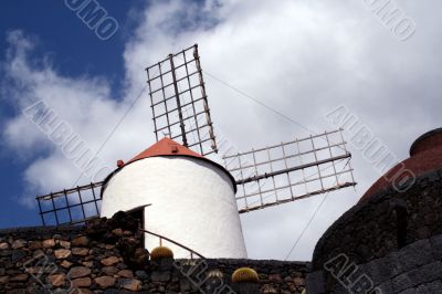 Windmill over blue sky
