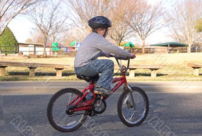 Boy Riding a Bike