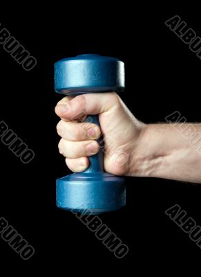 Dumbbell in a hand