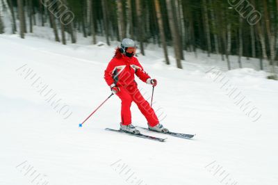 Skier in red suit