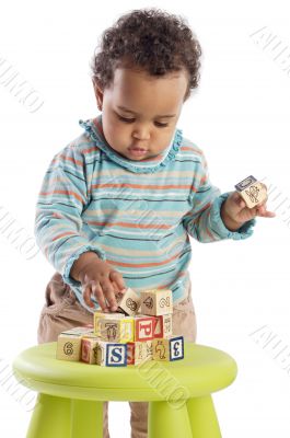 Girl playing with small pieces