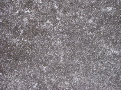 Ice-covered pavement surface